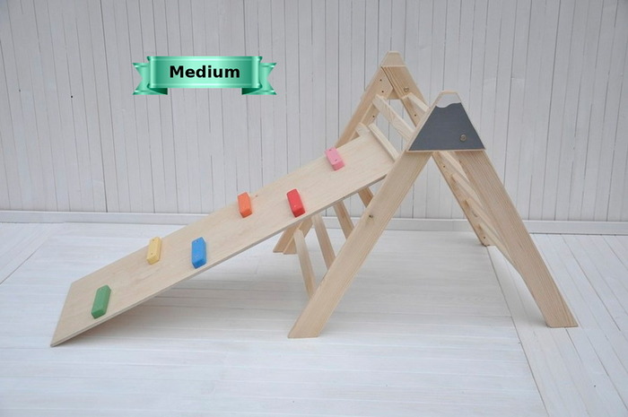 Montessori Baby nursery playroom organization at home for toddler kids.