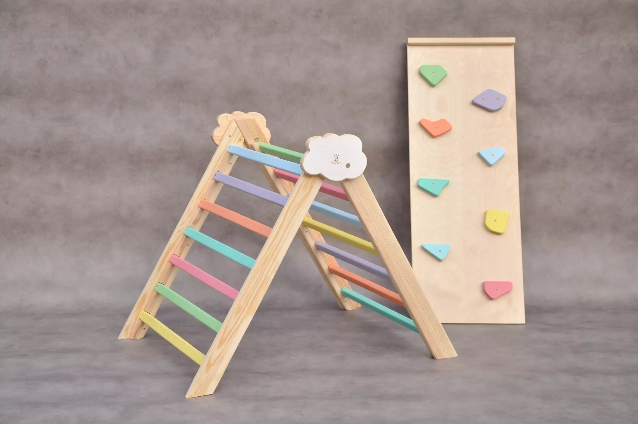 Cloud Rainbow wooden climbing frame with Rocks slide board, special Color Splash edition for cool summer birthday parties and family celebrations. Toddler learning and developmental toys by Barin Toys - move and learn experience.