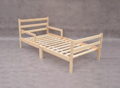 Toddler bed Baltic Pine Forest low Montessori frame bed with safety rails on both sides kiddie bed - it's the breath of Baltic pine forest the small child can feel and touch. Shop at Barin Toys UK online store amazing deals for sustainable kids room - european grown wood high quality handmade nursery furniture.